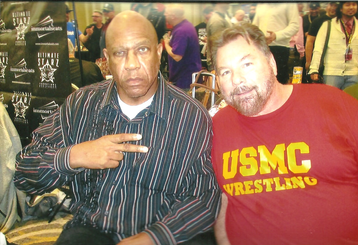 AM57 Hulk Hogan and Zeus ( Deceased ) Autographed WWF Wrestling Program w/COA