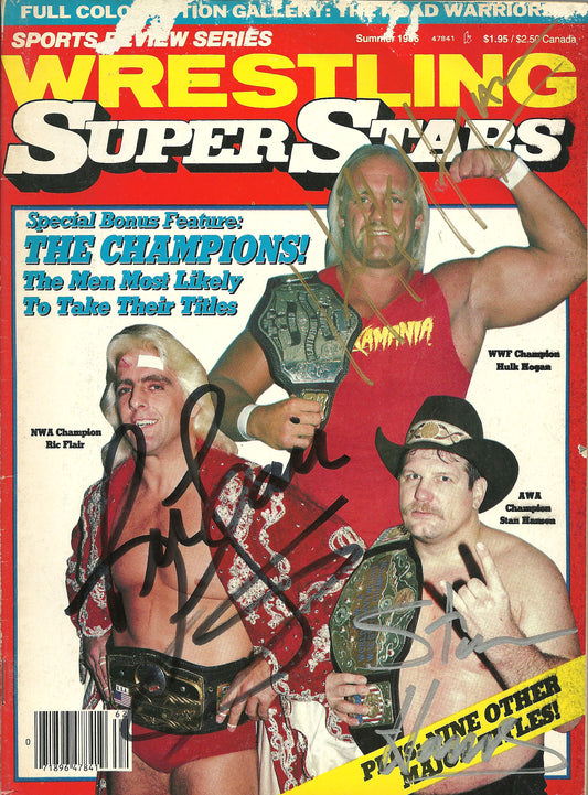 AM40 Hulk Hogan , Ric Flair , Stan Hansen Autographed Wrestling Magazine w/COA