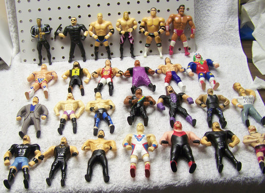 ATB1 Lot of WWF Attitude Era Bendies Undertaker , the Rock , Stone Cold Steve Austin.