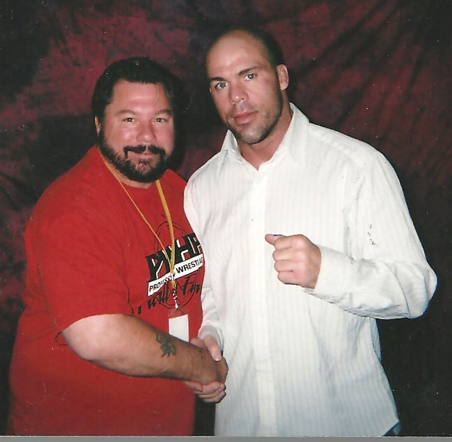 M313  Kurt Angle Autographed Wrestling Photo w/COA
