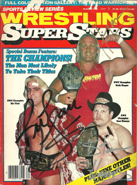 AM40  Hulk Hogan , Ric Flair , Stan Hansen Autographed Wrestling Magazine w/COA