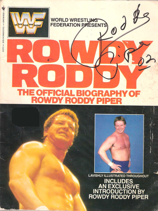 AM227  Rowdy Roddy Piper ( Deceased ) Autographed vintage Wrestling Magazine w/COA