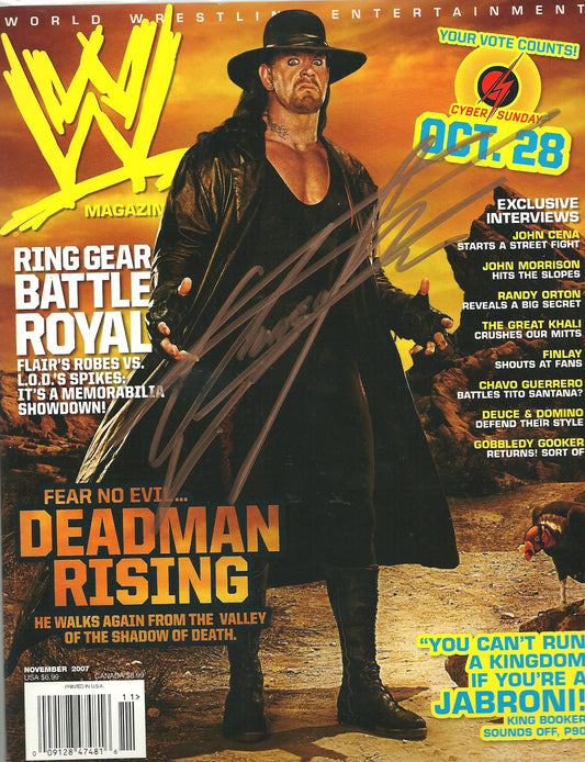 AM492  The Undertaker Autographed Vintage Wrestling Magazine w/COA