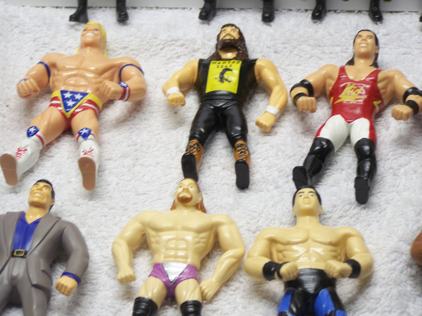 ATB1  Lot of WWF Attitude Era Bendies Undertaker , the Rock , Stone Cold Steve Austin.