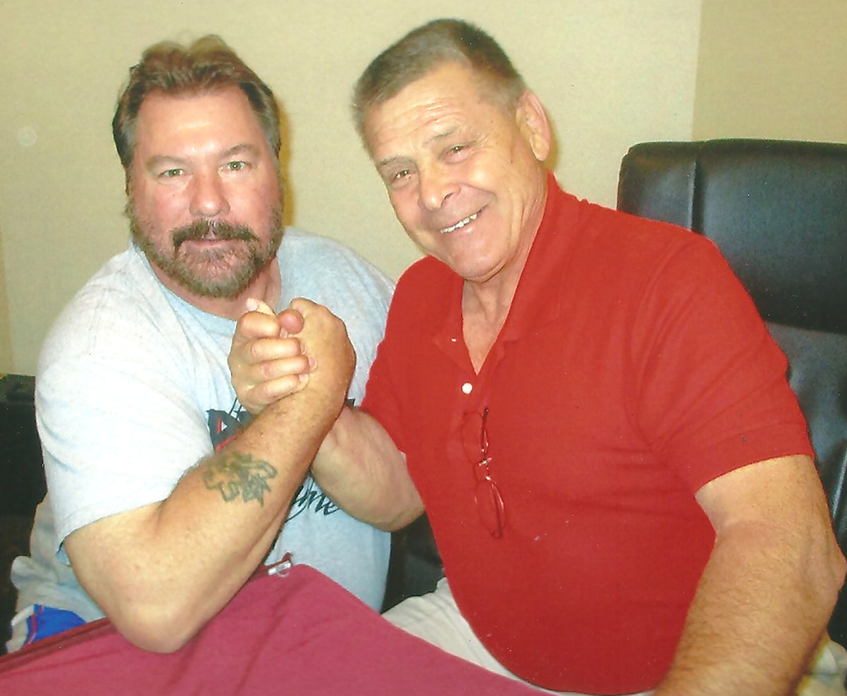 AM301  Honky Tonk Man Rugged Ronnie Garvin Signed Historical Wrestling Magazine  w/COA